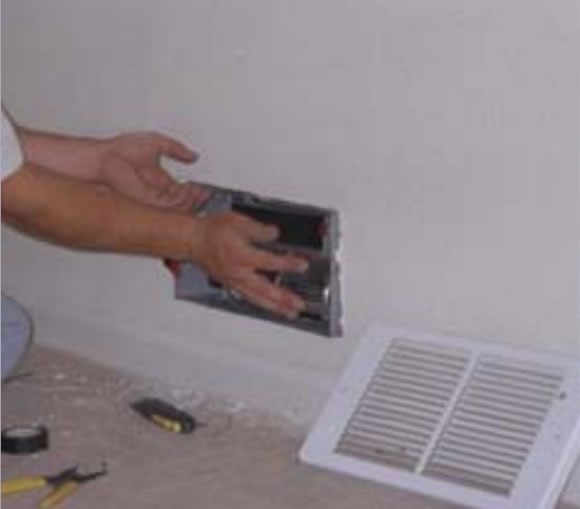 Attach screw at top of can