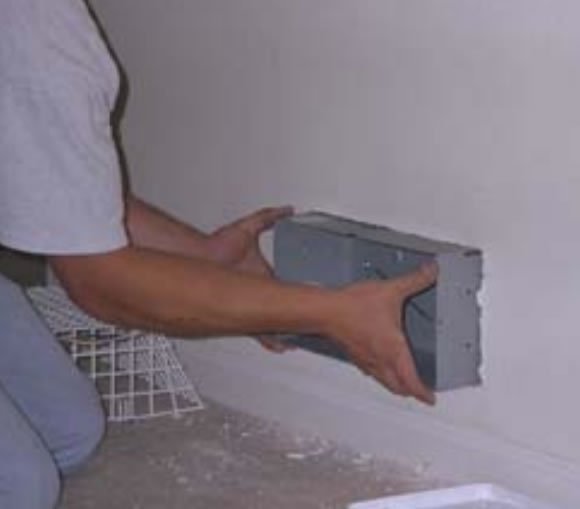 Insert can into wall